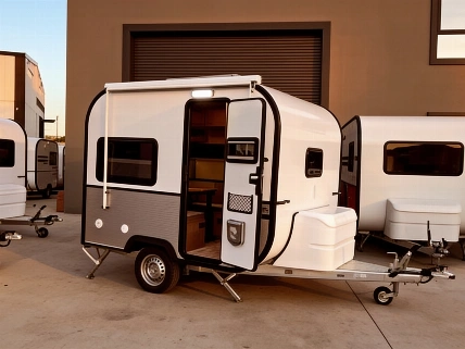 Europe’s Smallest Caravan Packs Three Beds, Kitchen and Bath in 2.5 Meters RUSSPAIN.com