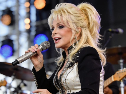 Dolly Parton: Six Decades Defining Country Music and Beyond RUSSPAIN.com