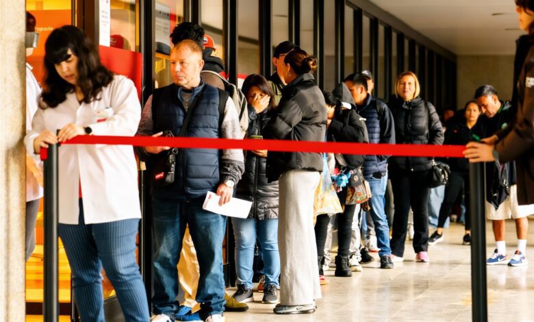 Migrants in Madrid Queue for Legalization Certificate